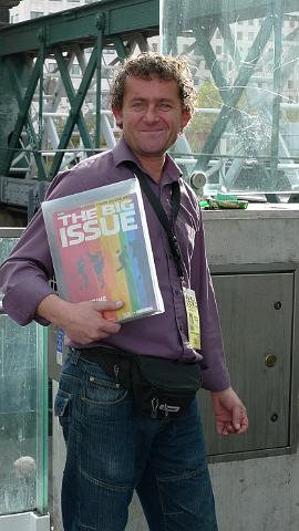 Homeless guy selling magazines.JPG